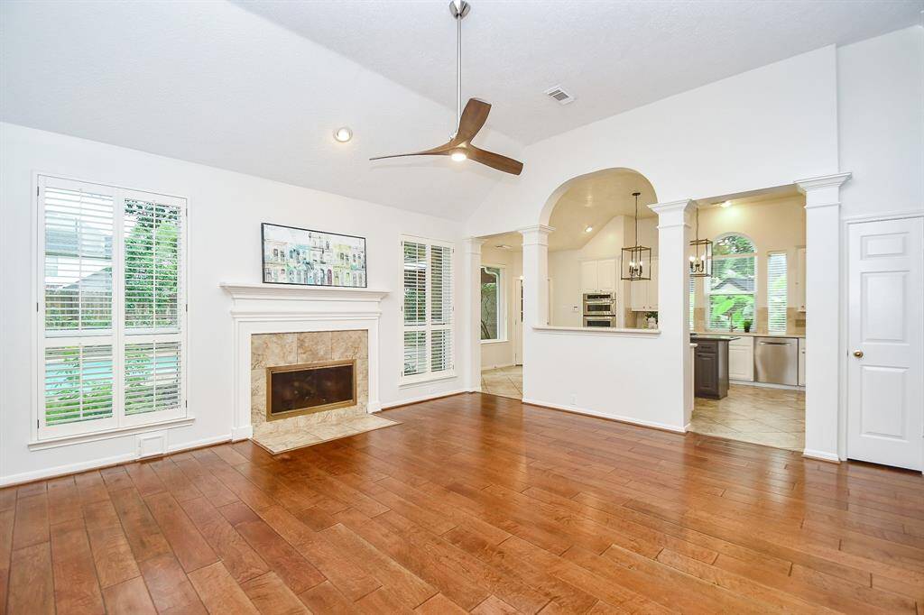 Large Family Room with Engineered Wood Flooring.  Open to the Kitchen!