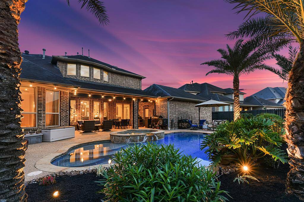 Escape to paradise without leaving home. This resort-style backyard could be YOURS!
