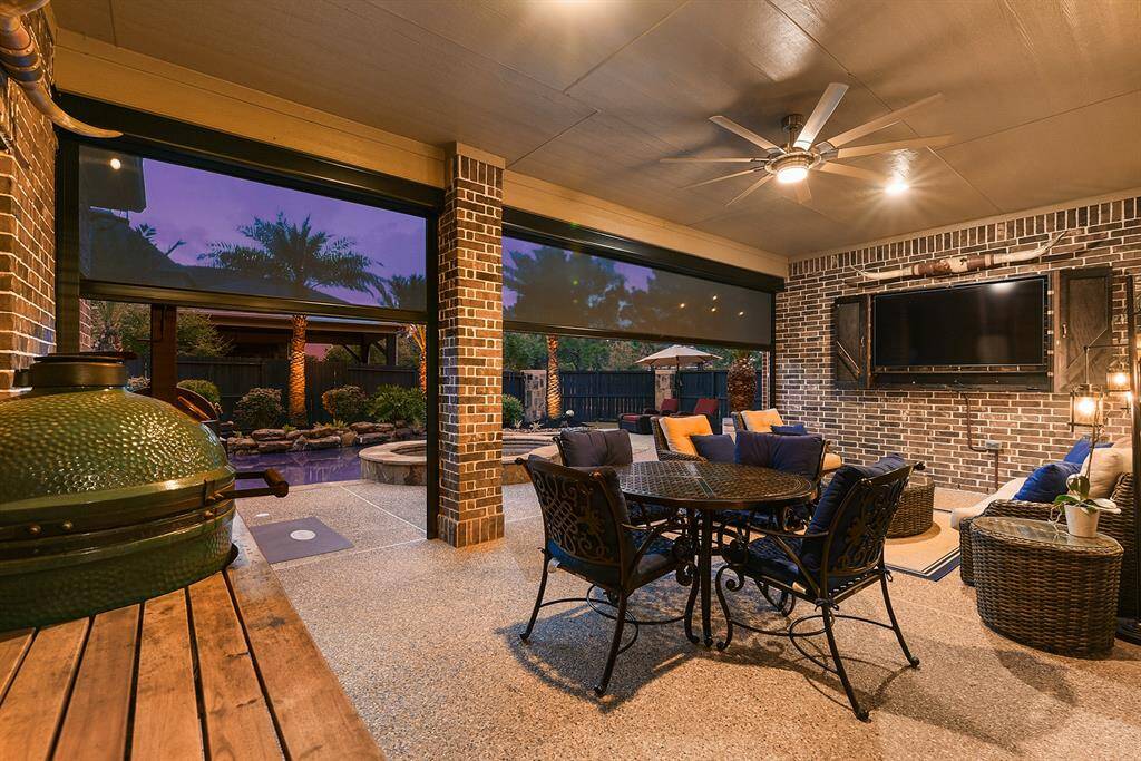 Electric solar shades have been added to the back patio.  With just a click of the remote they can be lowered or raised.  They keep the patio several degrees cooler when down, and help keep out mosquitoes.  They are made of durable material that can withstand up to 120 mph winds.