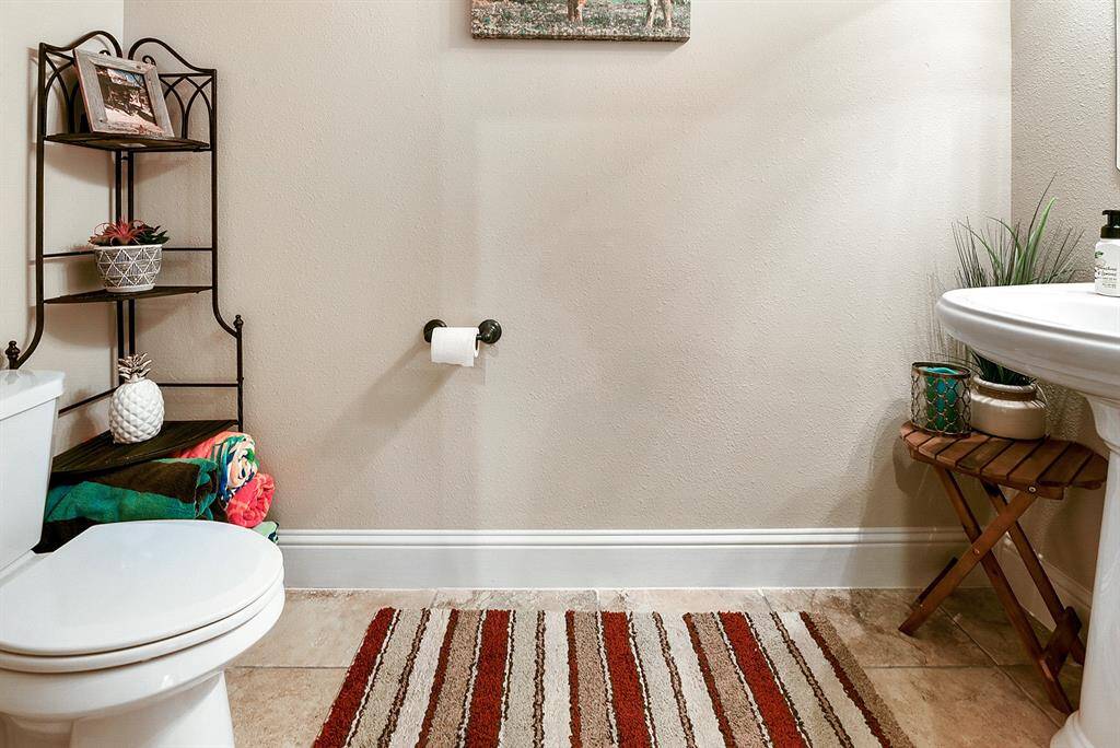 Half bath located off the patio-so convenient!