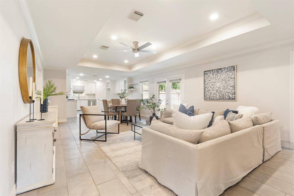 Find direct access to the patio from the kitchen and informal living area
