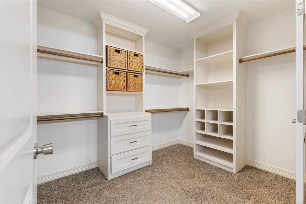 A rare find for the area - this incredible walk-in primary closet!