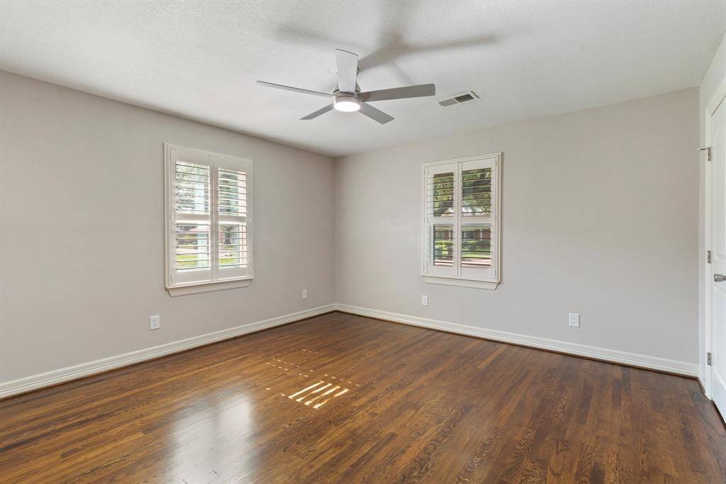 The first of three secondary bedrooms