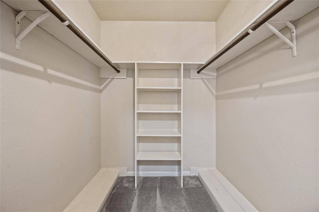 Closet space with minus clothes.
