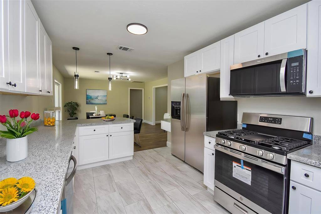 Notice the stainless steel appliances.