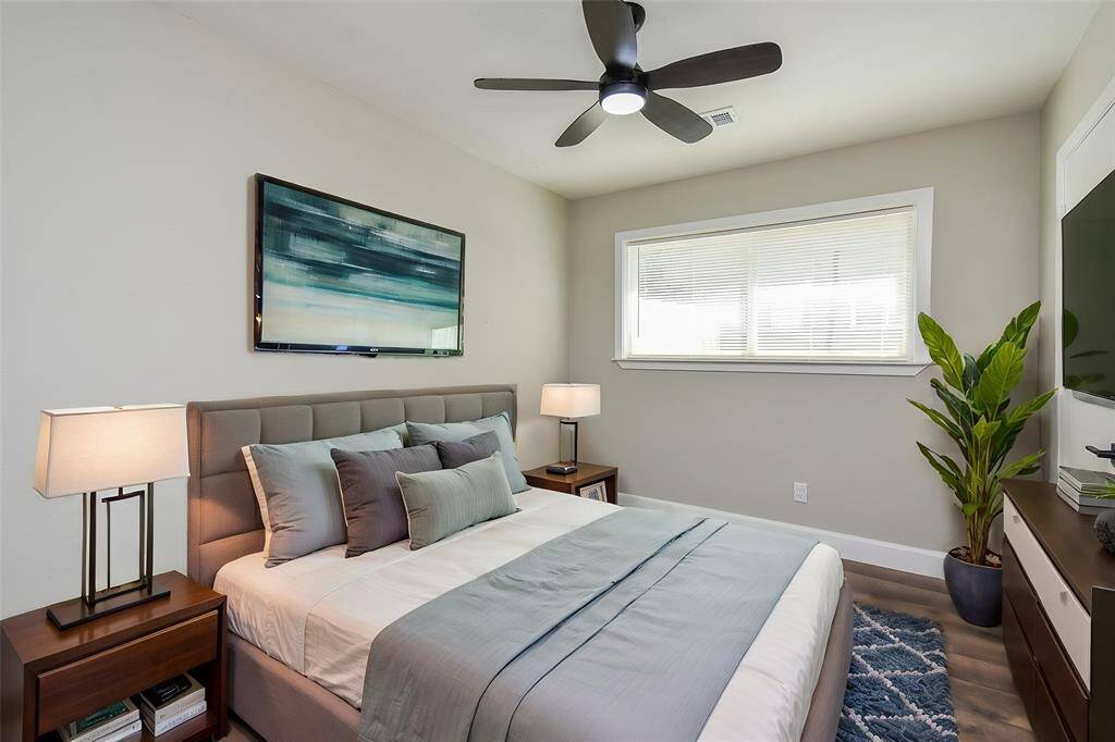 Step into this spacious bedroom.