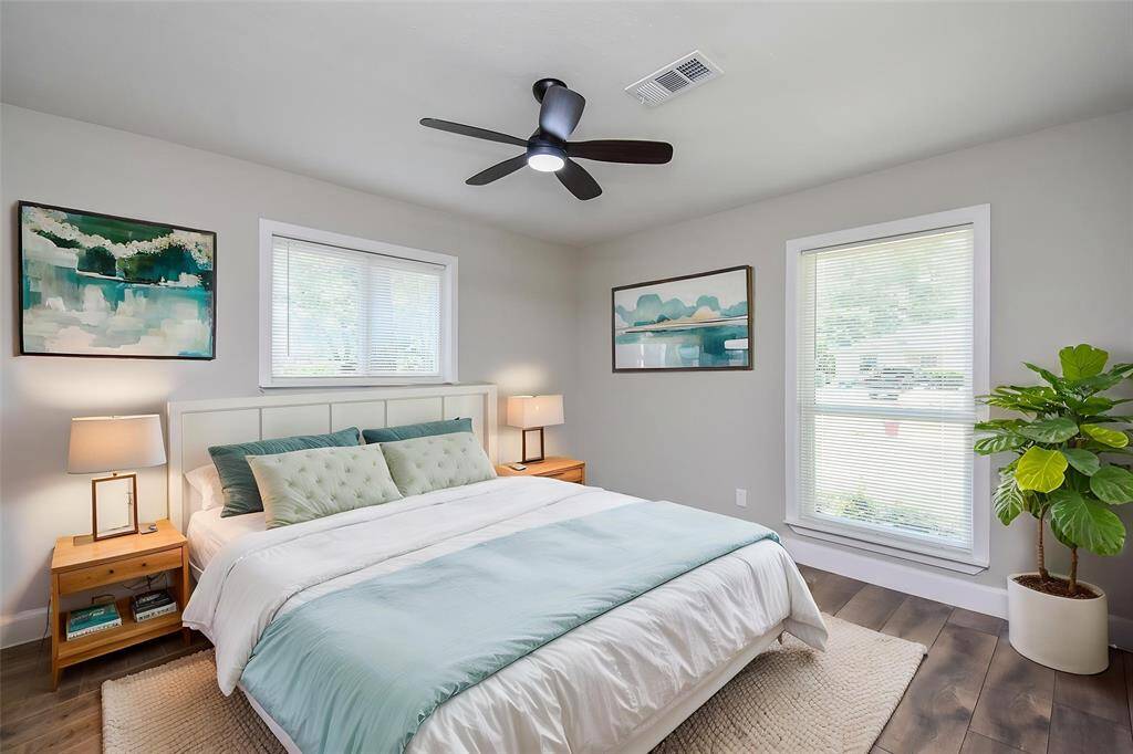 Notice the large windows and the ceiling fan ensures comfortable temperatures year-round.