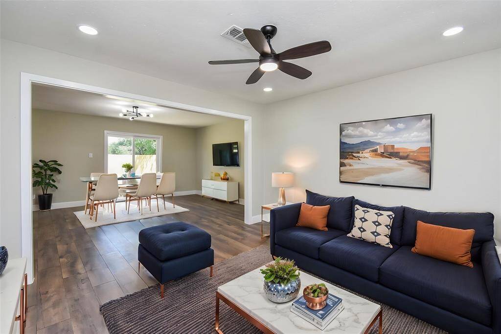 Notice the wood-like flooring that flows throughout the home.
