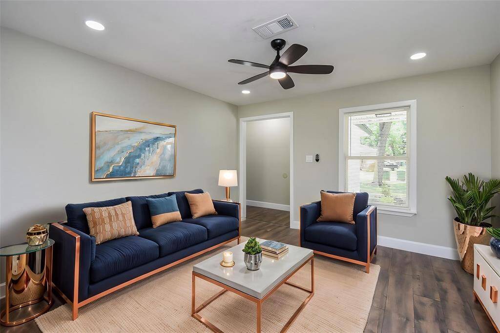 Enjoy ample natural light through well-placed windows, highlighting the modern aesthetic of the home.