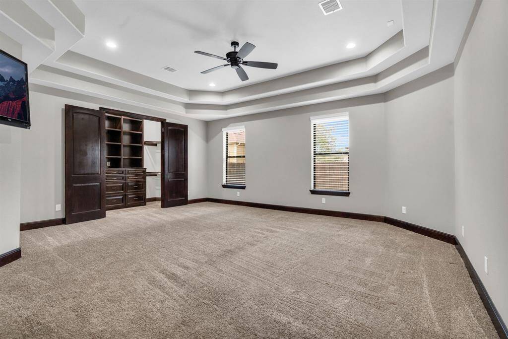 Welcome to your Primary Retreat with Tray Coffered Ceilings & Large Windows overlooking the Backyard Space! 5912 T St., Katy, TX  77493