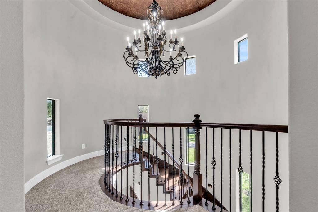 A look at this beautiful chandelier located at the top of the stairs! 5912 T St., Katy, TX  77493
