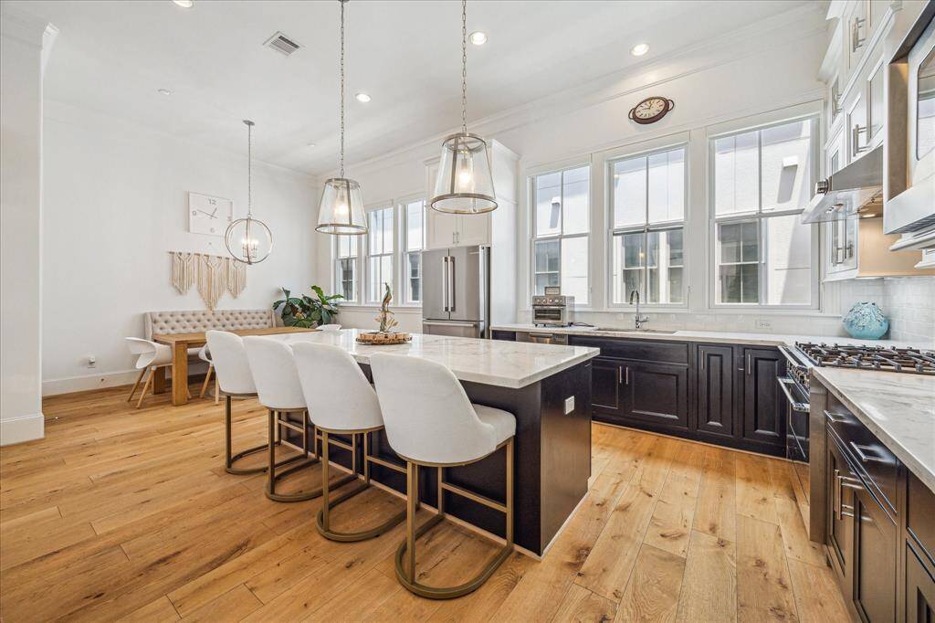 Stunning kitchen island and lovely floors!