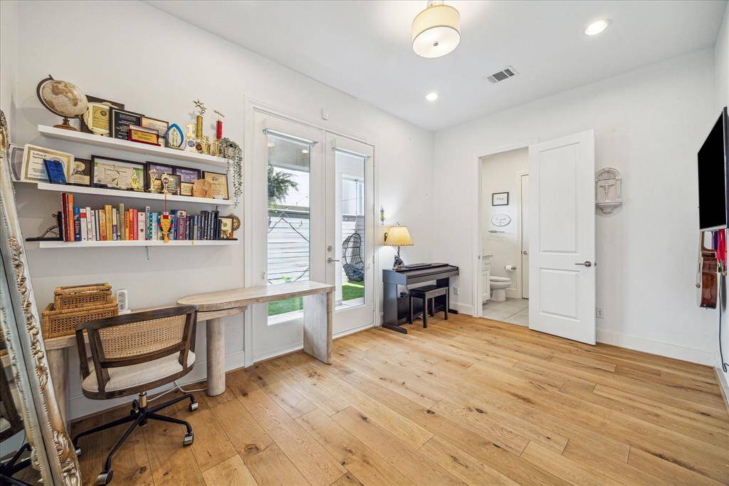 Spacious first floor room perfect for a guest suite, office or both!