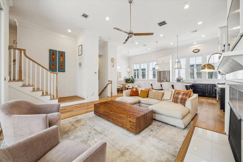 Open living/kitchen/dining area flooded with natural light!