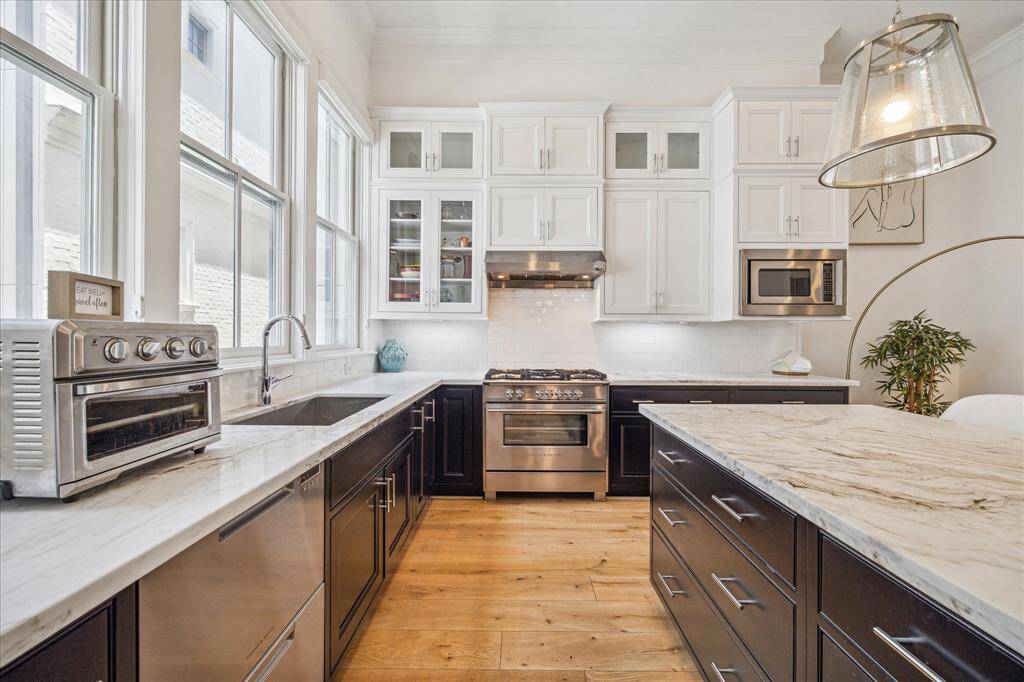 Tons of natural light and high end appliances!