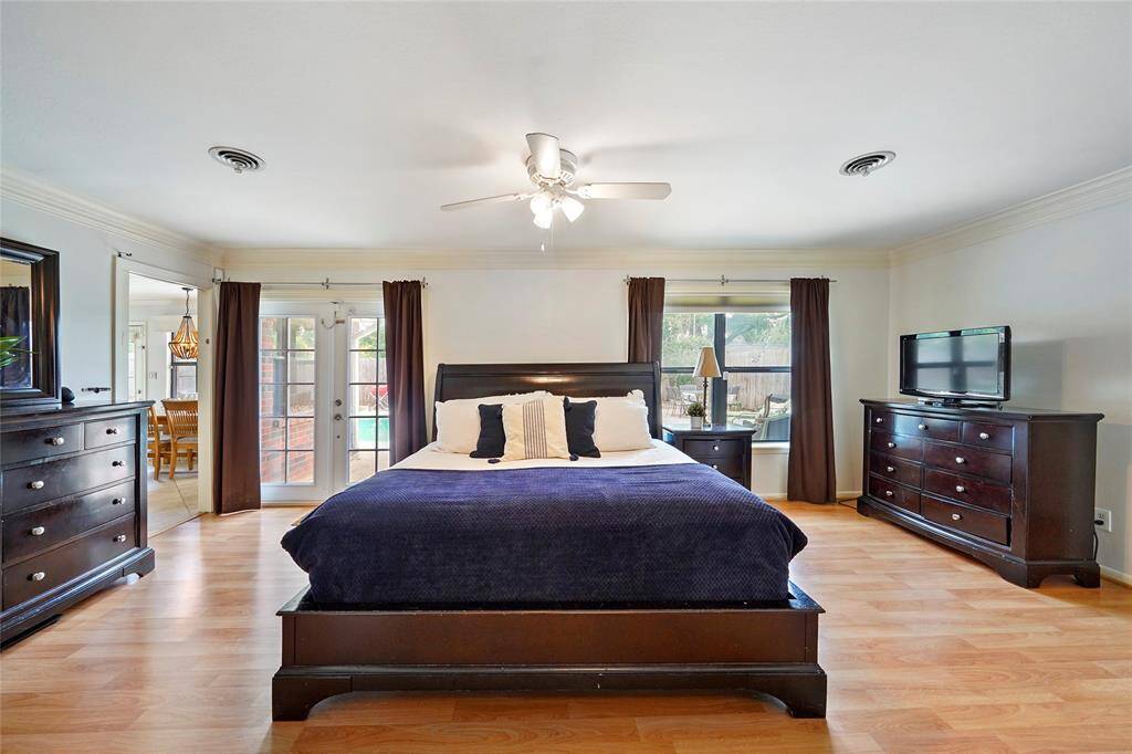 The first floor primary suite has access to the exterior and your glistening pool, a large closet, office/nursery/sitting area, and opulent bath.