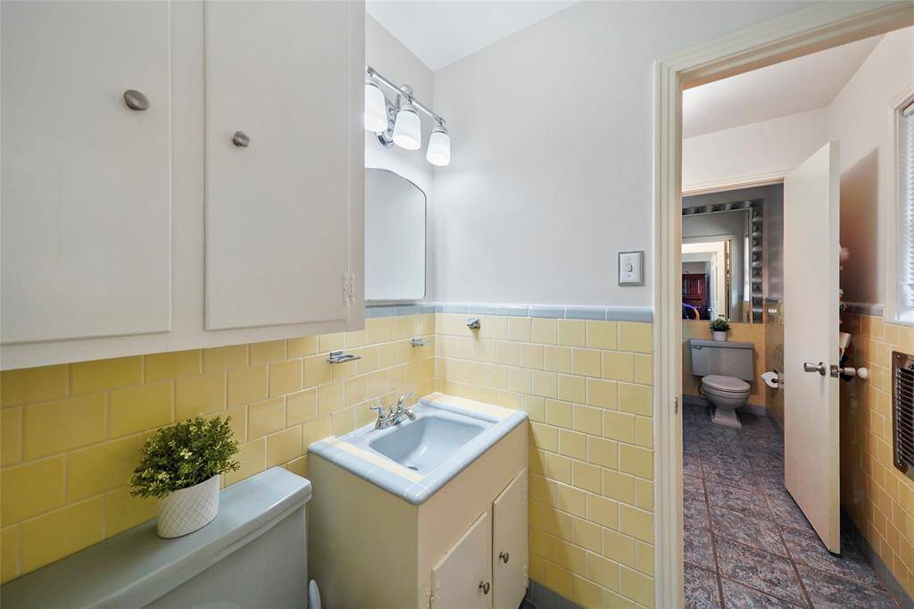 Your secondary full bath is located between the two secondary bedrooms on the first floor.