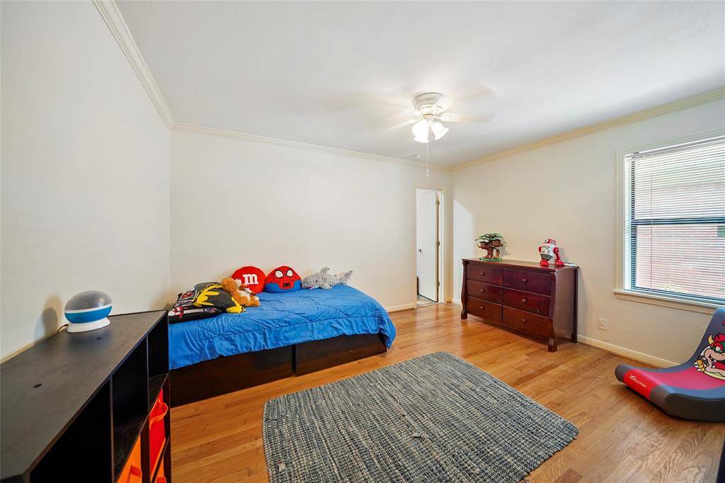 The other secondary bed on the first floor offers solid wood floors and large closets.
