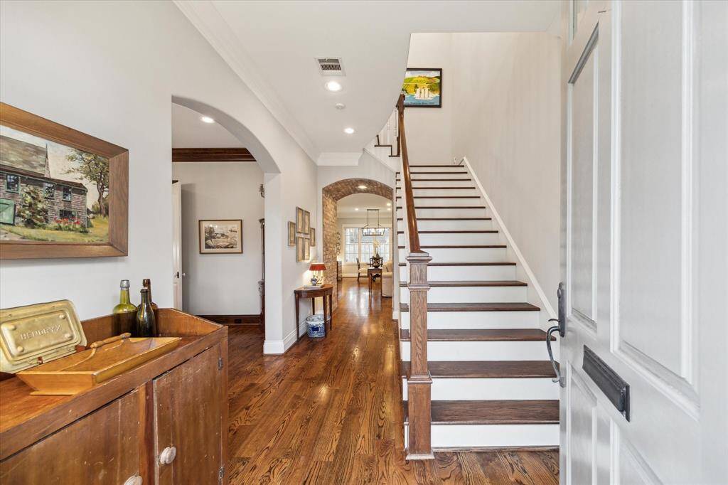 Elegant details abound, from the 10-foot ceilings that enhance the sense of space to the rich hardwood floors that add warmth and character.
