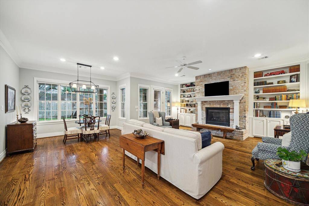 The thoughtfully designed floor plan enhances daily living, with the kitchen seamlessly flowing into the breakfast area and spacious family room.