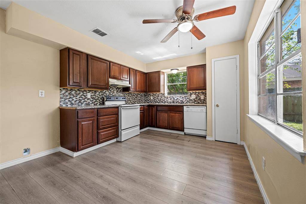 Natural light fills the kitchen creating a bright space to prep meals.
