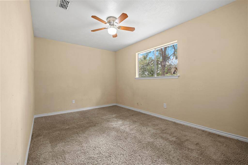 Another view of the spacious bedroom.