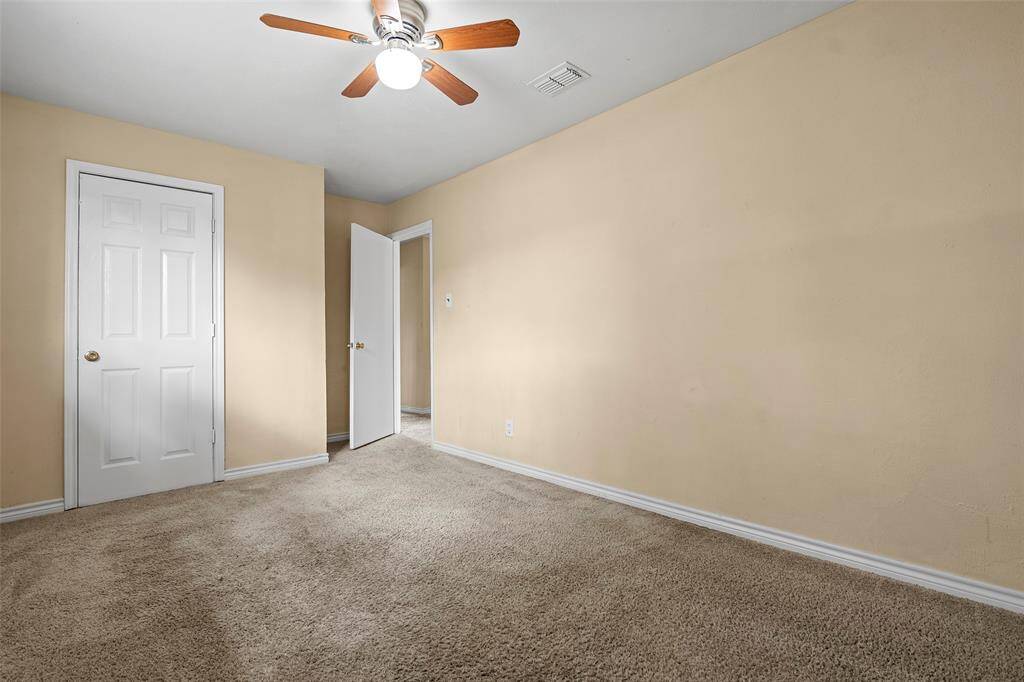 Neutral carpet and paint ready for this room to make it your own.