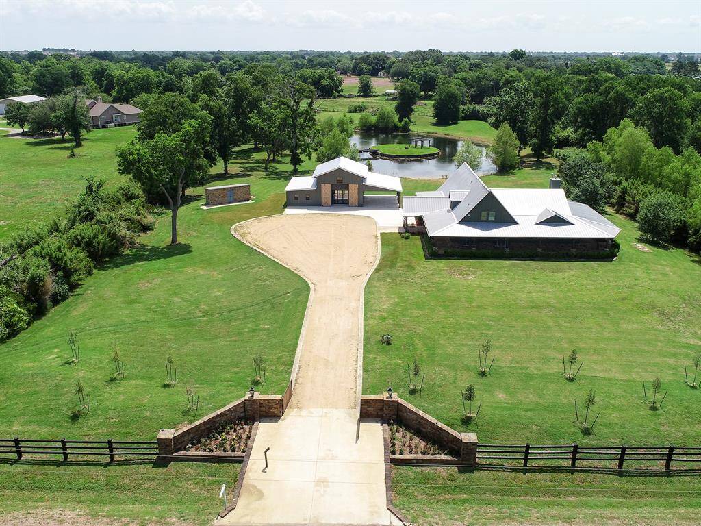Once passing thru the Gated entrance, only then is the magnitude of this 5.5-Acre property and its extraordinary natural beauty realized. It is the essence of Texas charm with home and barn emersed in stunning natural beauty.