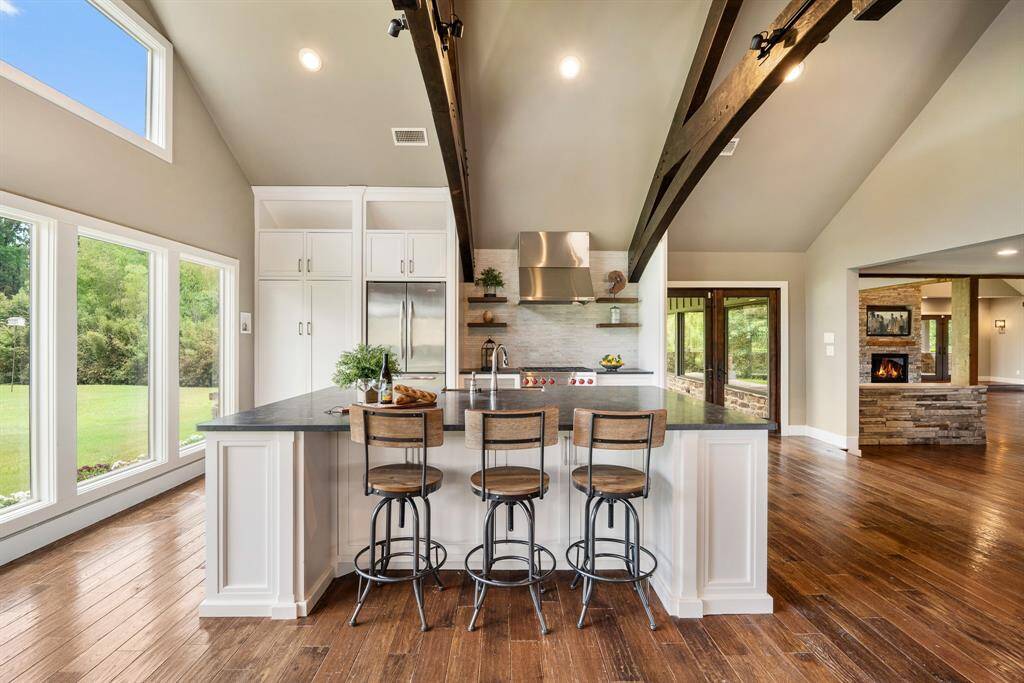 This view of the Island offers a better view of the size that will easily accommodate 3-chairs.