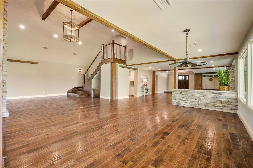 This offers a view of the Dining Area looking back towards the Foyer. Notice how open the space is and how easily Dining Area flows to the grand Family Room.