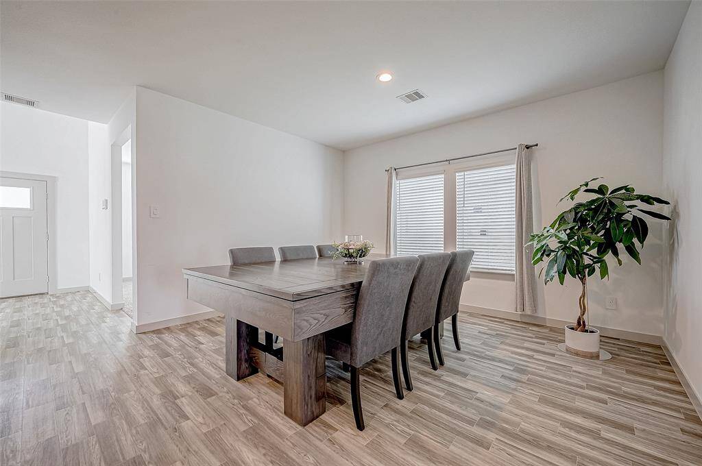 The large window fills the room withnatural light.