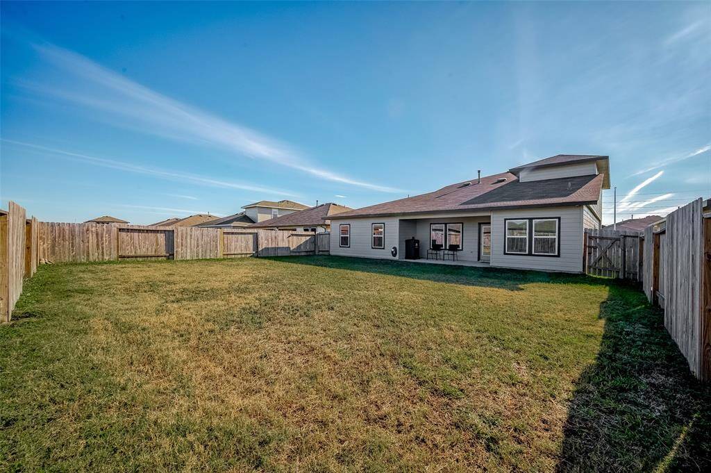 This backyard is a vast and versatilespace, with the sloping roofcompleting the pretty picture.