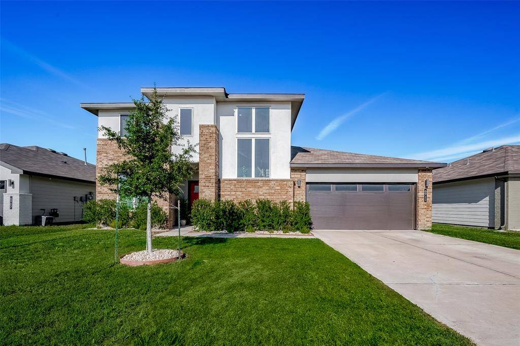 With its attractive facade, neatlandscaping, and generously sizedfront yard, this home exudes curbappeal.