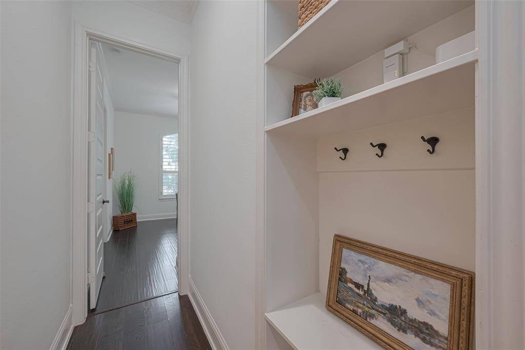 Book bag and storage area off the laundry and garage entry.