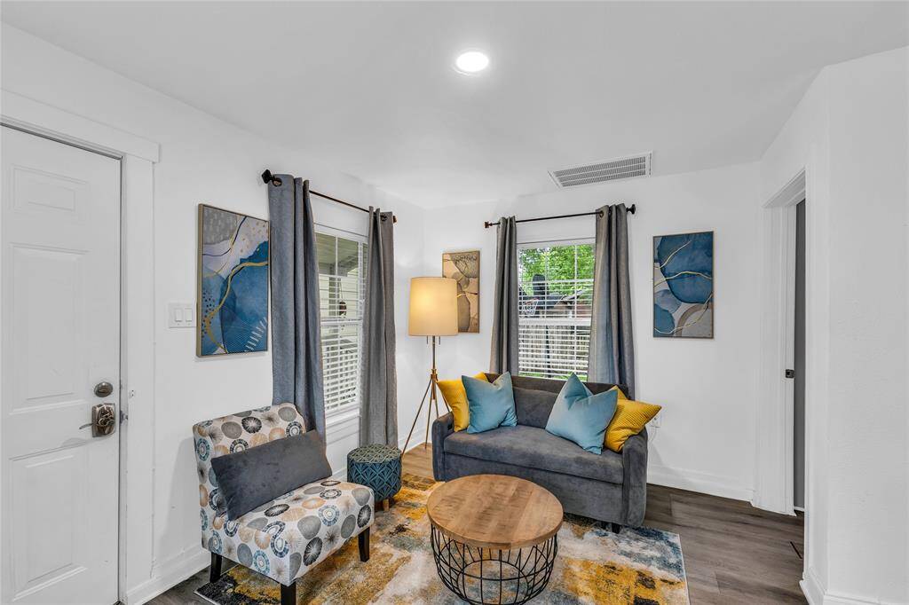 Modern, cozy living space with stylish furnishings, ample natural light, and contemporary decor.