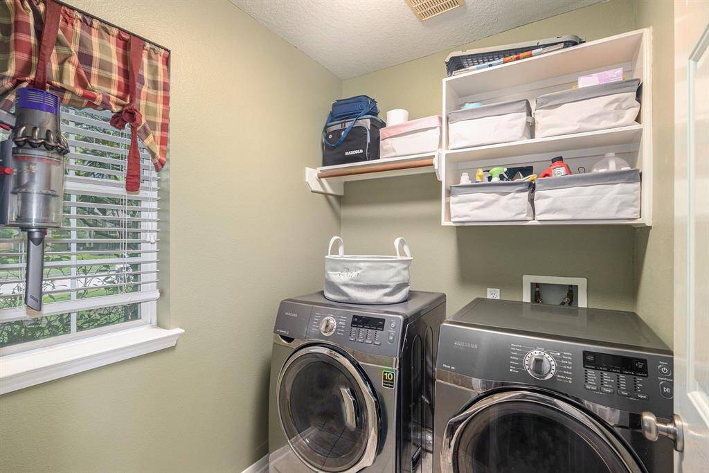 The Kitchen overlooks the spacious living room and breakfast nook.