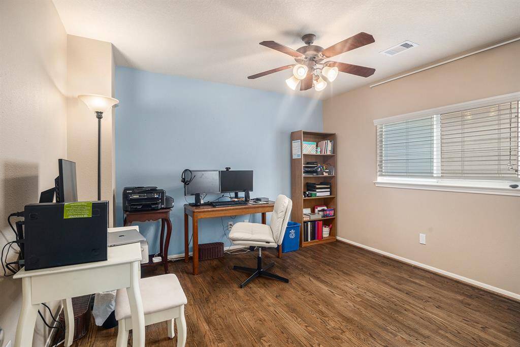 Secondary Bedroom 1 serves well as a Home Office.