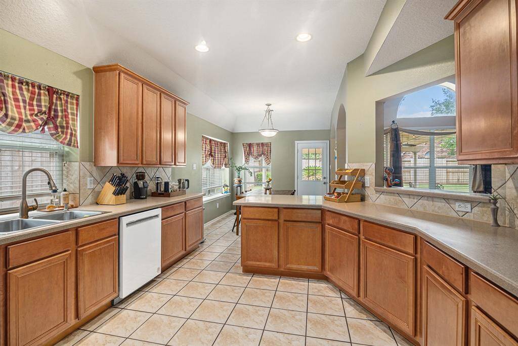 Lots Of Windows throughout the home bring in natural light everywhere.