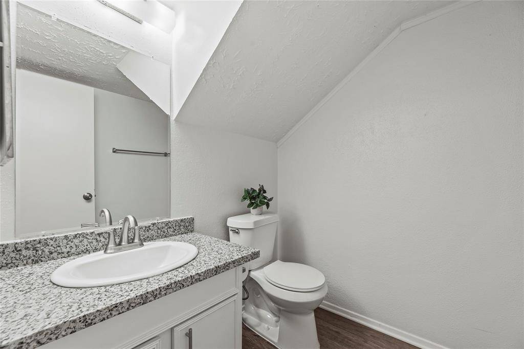The downstairs half bath for ease and convenience.