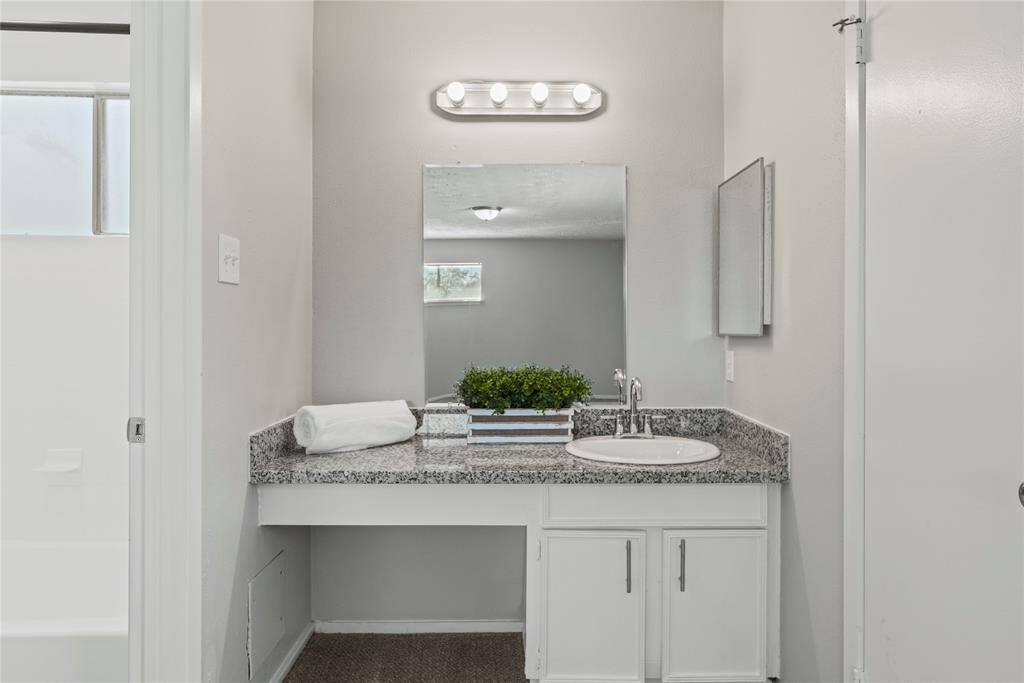 Large vanity with private storage in your primary bath.