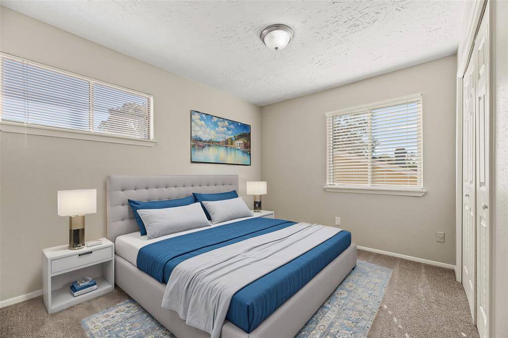 Here is your spacious second bedroom, offering comfort for family or guests.