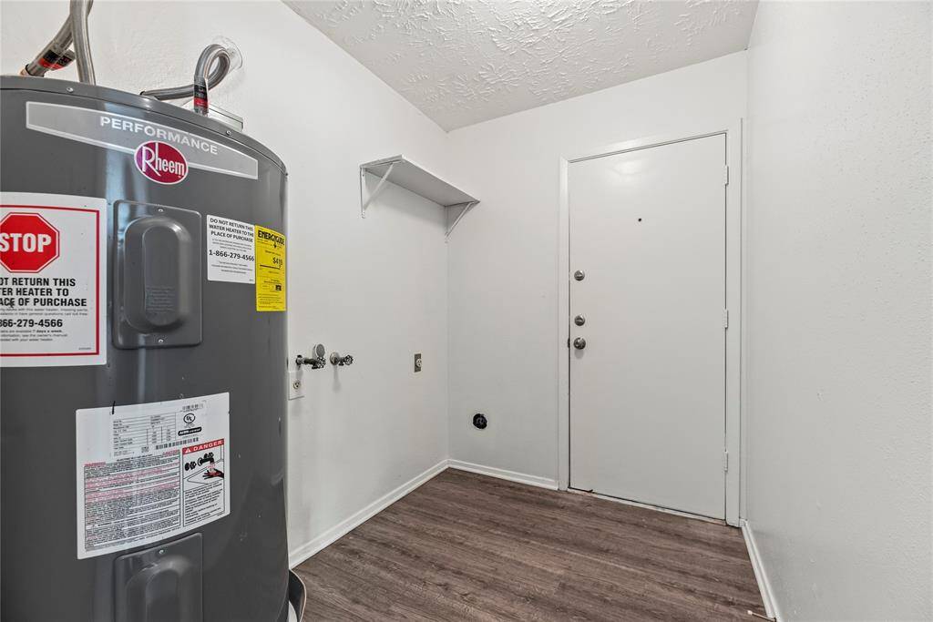 Before heading outside is your thoughtfully designed, dedicated laundry area.