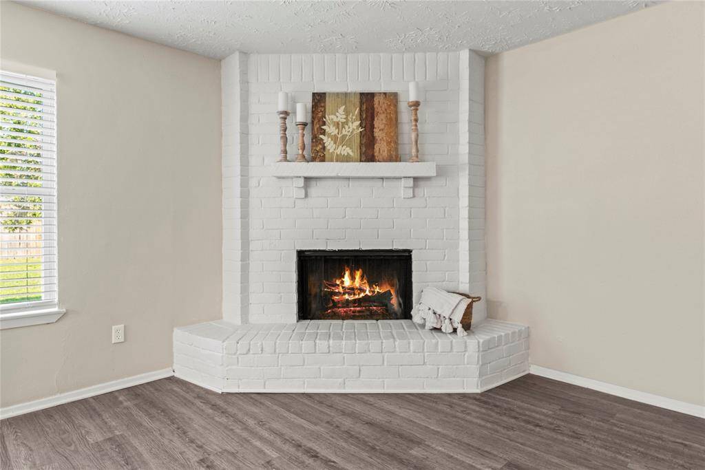 The soft glow of the flames adds a mesmerizing quality to the space, creating a cozy retreat from the outside world.