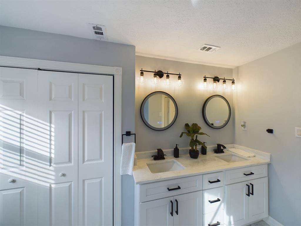 Primary Bath with Dual Vanity and Large Storage Closet