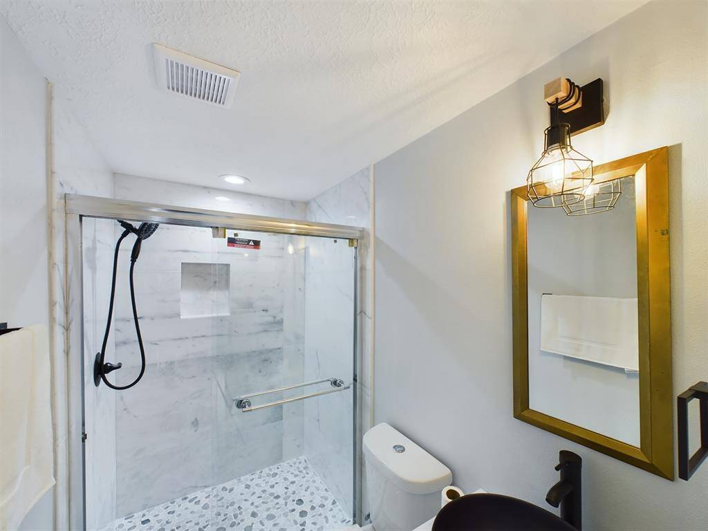 Suite Bathroom with Stand Alone Shower