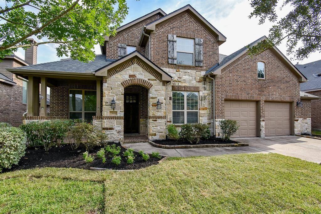 Vibrant greenery, mature trees, and colorful flowering plants create a natural oasis, while manicured lawns and thoughtfully placed shrubs provide structure and elegance.