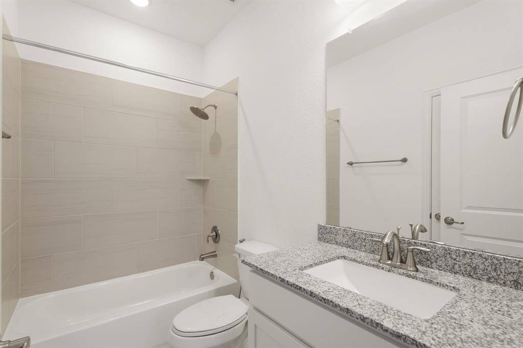 With its own private entrance, the Guest Suite Bathroom includes a practical shower/tub combo that meets every guest’s needs.