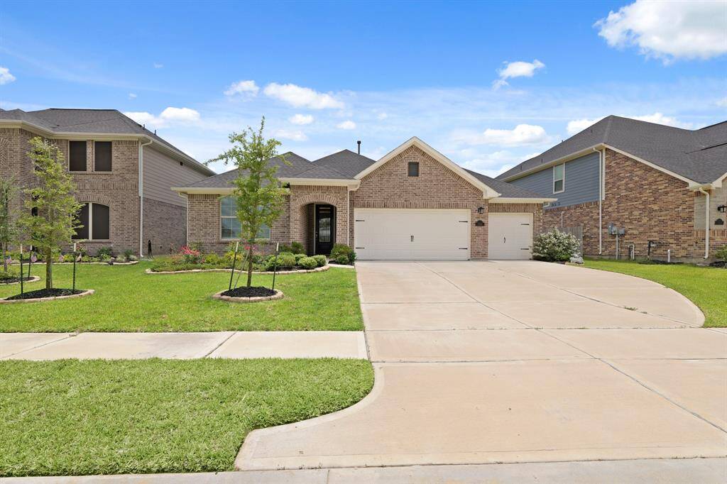 Charming single-story home with plenty of parking space, double-wide driveway and a roomy 3-car garage welcome you home!