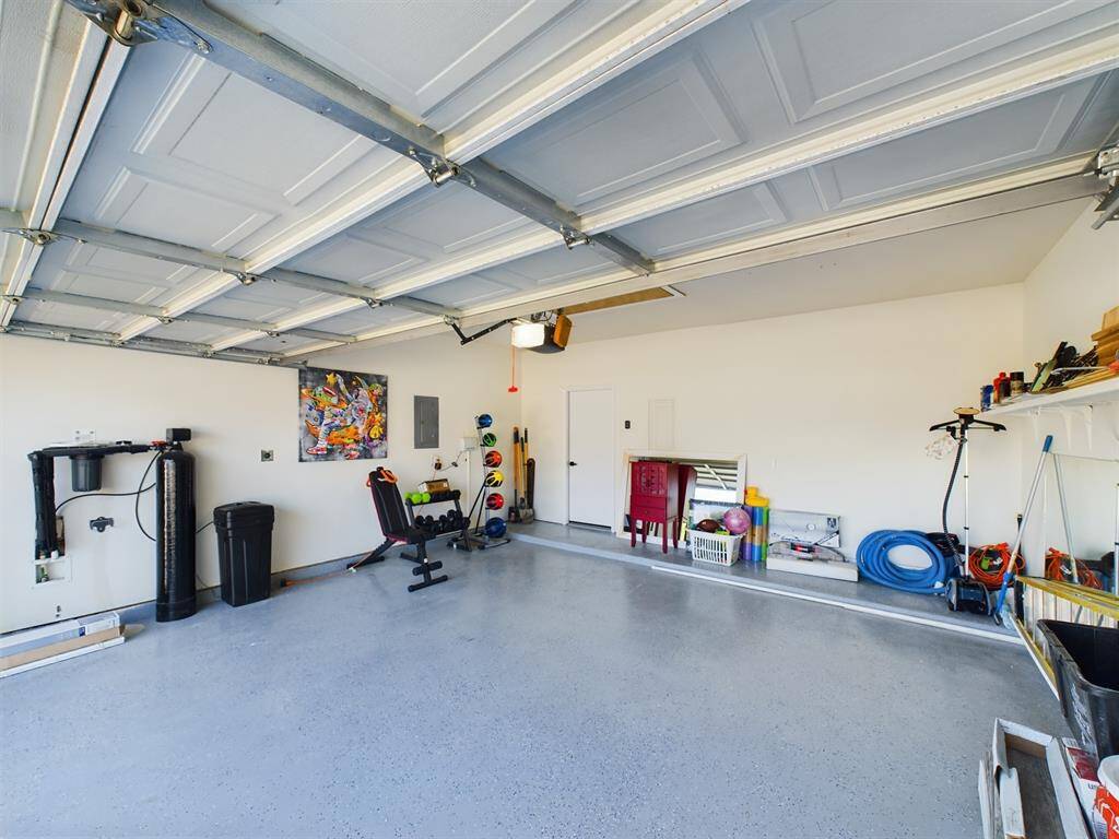 Spacious 2-Car Garage and Water Softening System