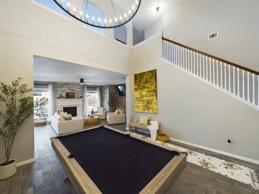 Formal Dining opens to the Kitchen and Family Room